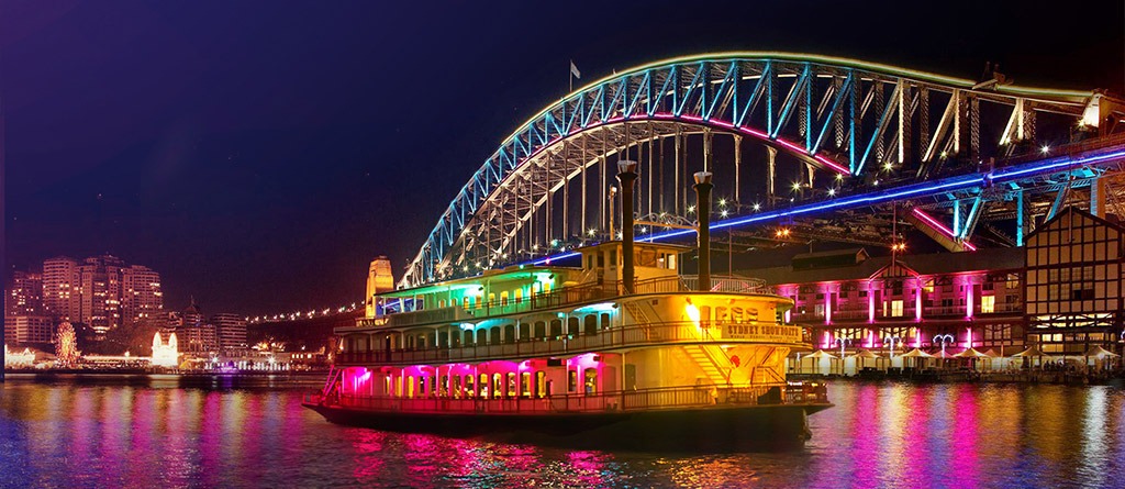 Sydney Harbour cruise during Vivid Sydney with colourful city lights